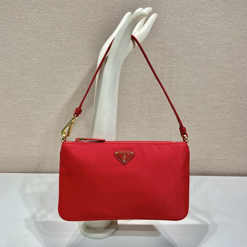 Pra*a clutch bags